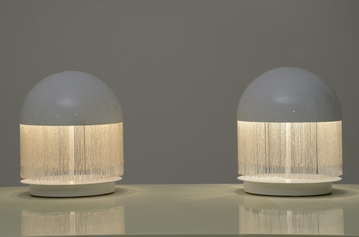 Pair of 1960's Italian white laquered table lamps with thin glass pendents.
