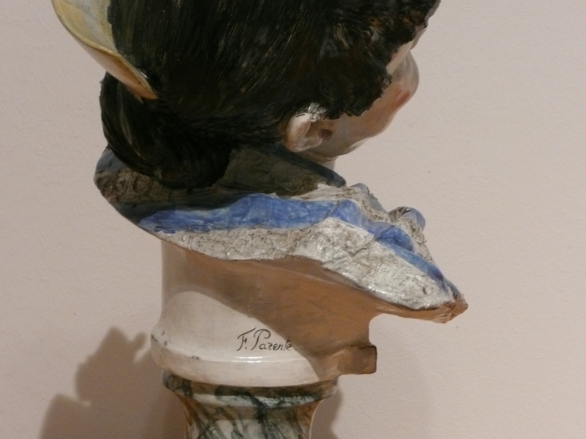 Painted ceramic figure of a young woman.  Francesco Parente, Florence 1940ca.  Signature on the back.