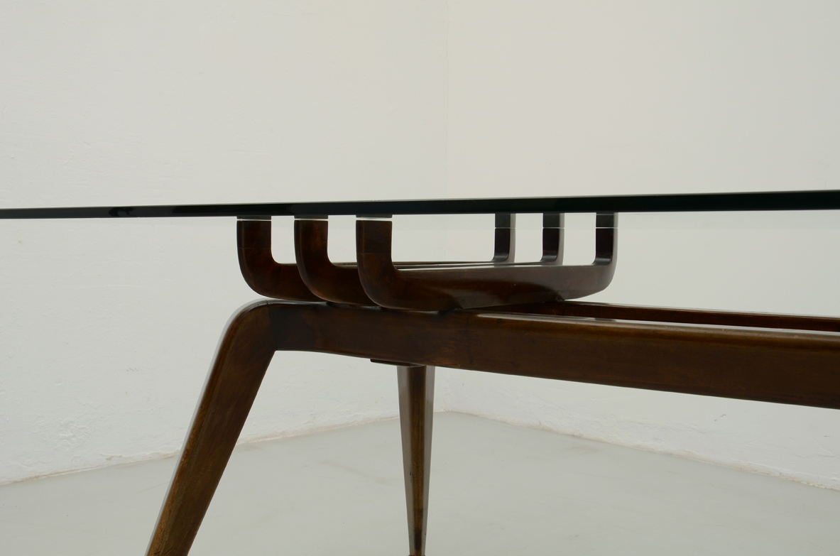 Gianni Vigorelli, 1950's stunning dining table with a beautiful carved wooden base and crystal glass top.