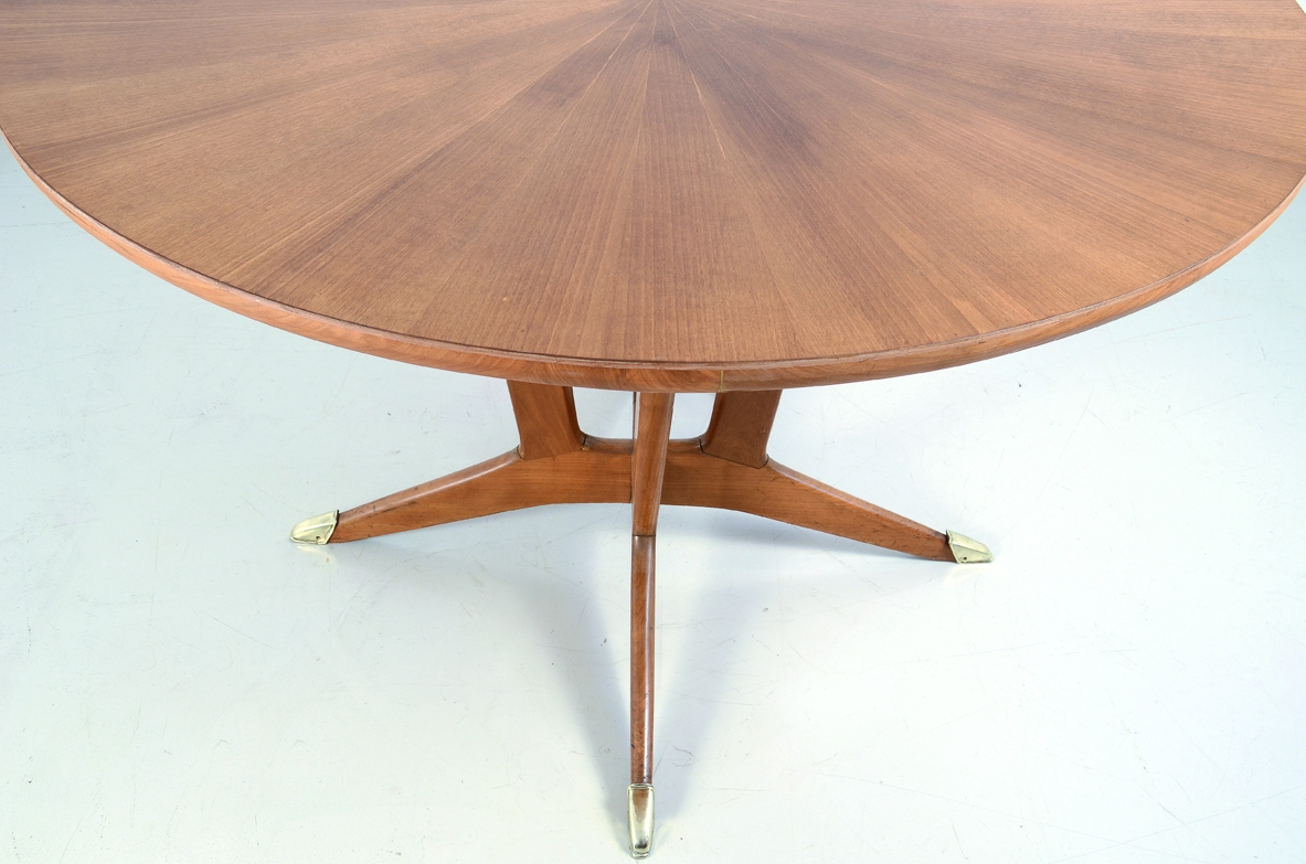 Elegant Italian 1950's table in cherry wood with bronze tips.