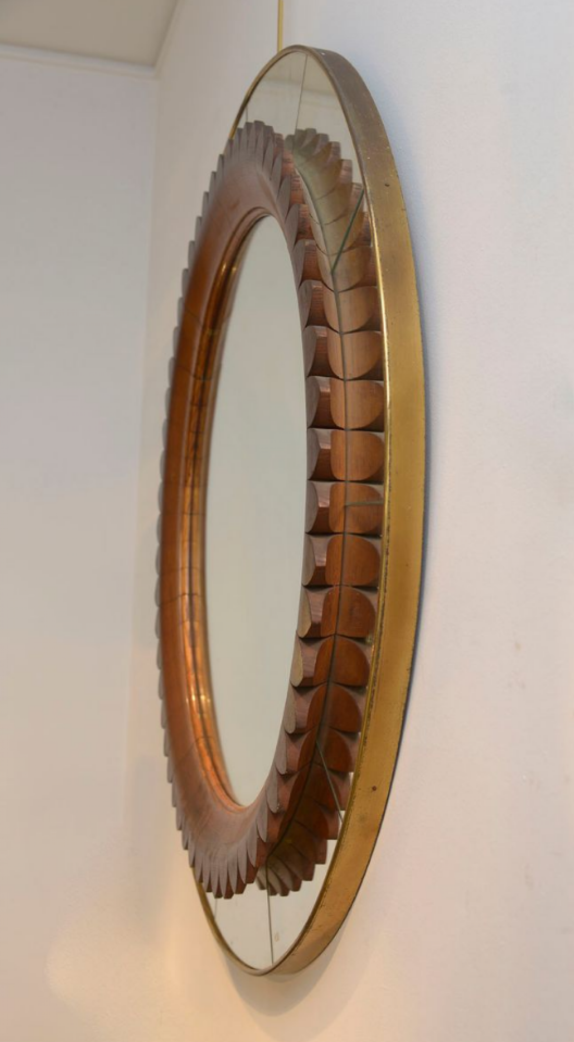 Pierluigi Colli, rare sculptural mirror framed with oak and mirrored crystal glass, Italy 1940's.