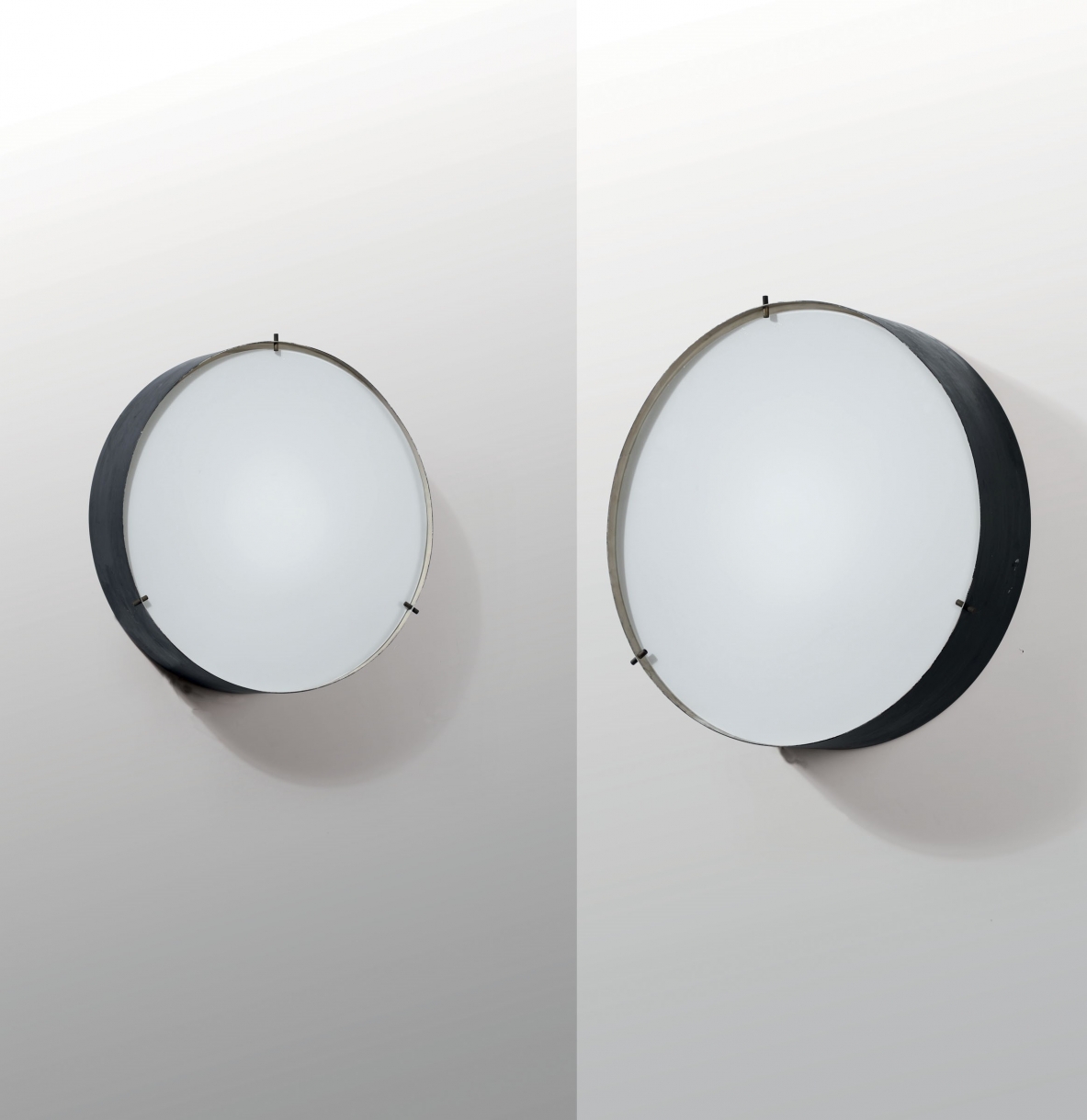 Bruno Gatta, pair of wall lamps with structure in lacquered metal and opal glass. 