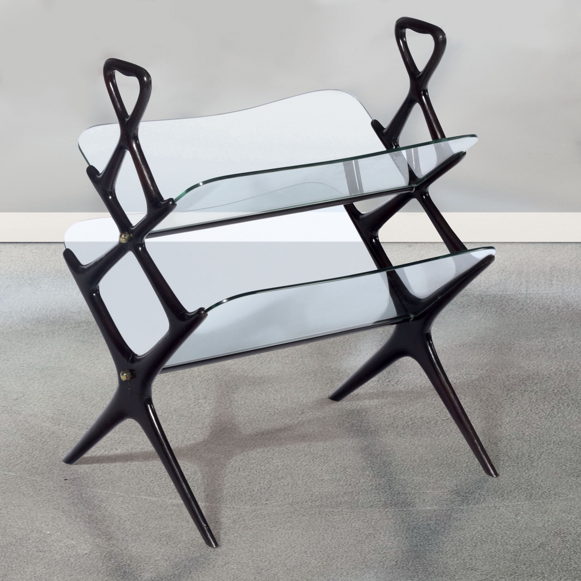 Cesare Lacca, elegant magazine rack with wooden frame and beveled glass tops.