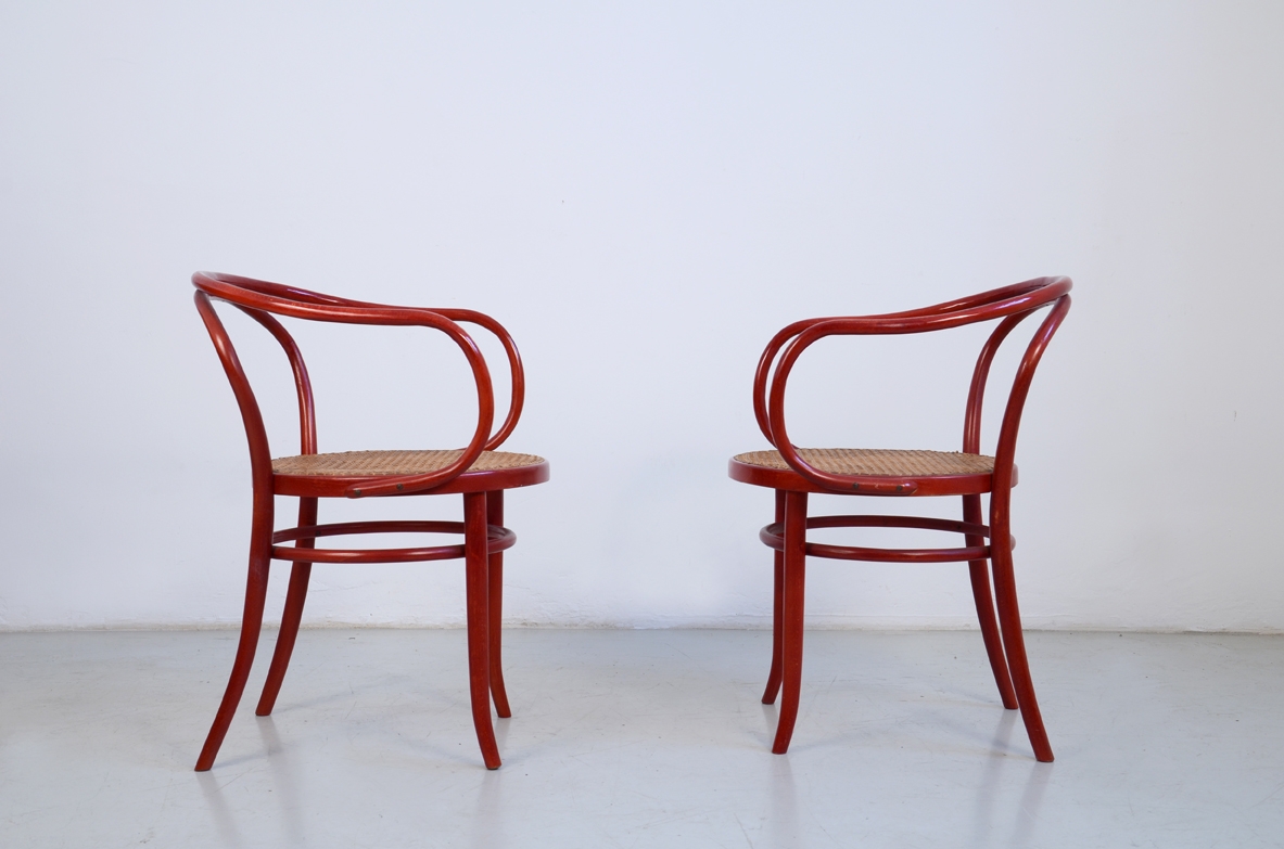 Pair of 1970's armchairs in bent red lacquered wood with Vienna straw hand made seat, prod.Bertoletti Torino.