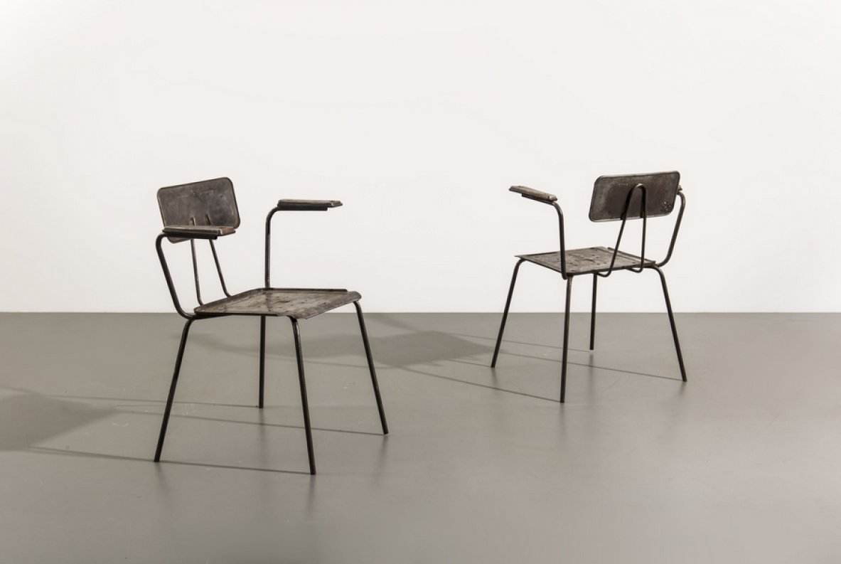 BBPR, two iron armchairs made for Olivetti. Italy, circa 1960.