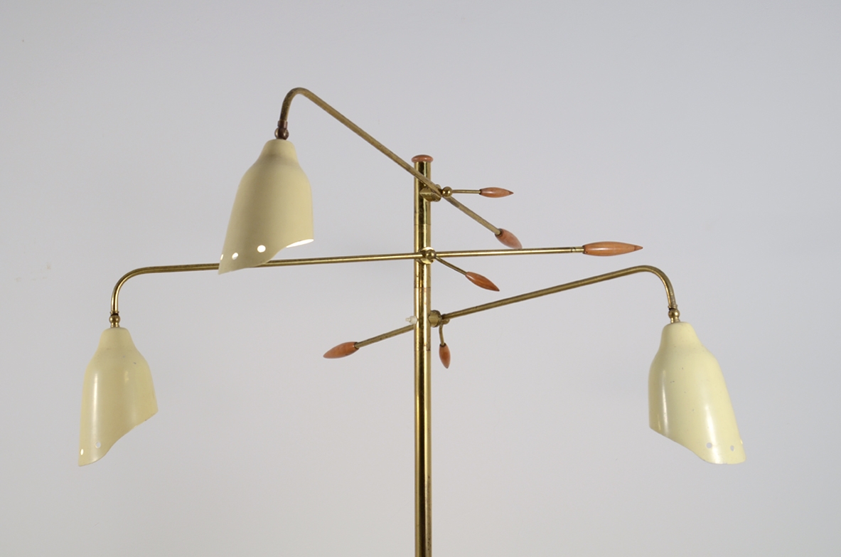 Arredoluce, 1950's floor lamp in brass with three adjustable metal shades and elegant tips in wood.