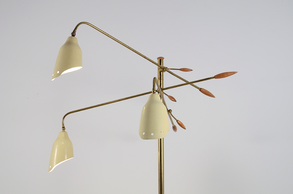 Arredoluce, 1950's floor lamp in brass with three adjustable metal shades and elegant tips in wood.