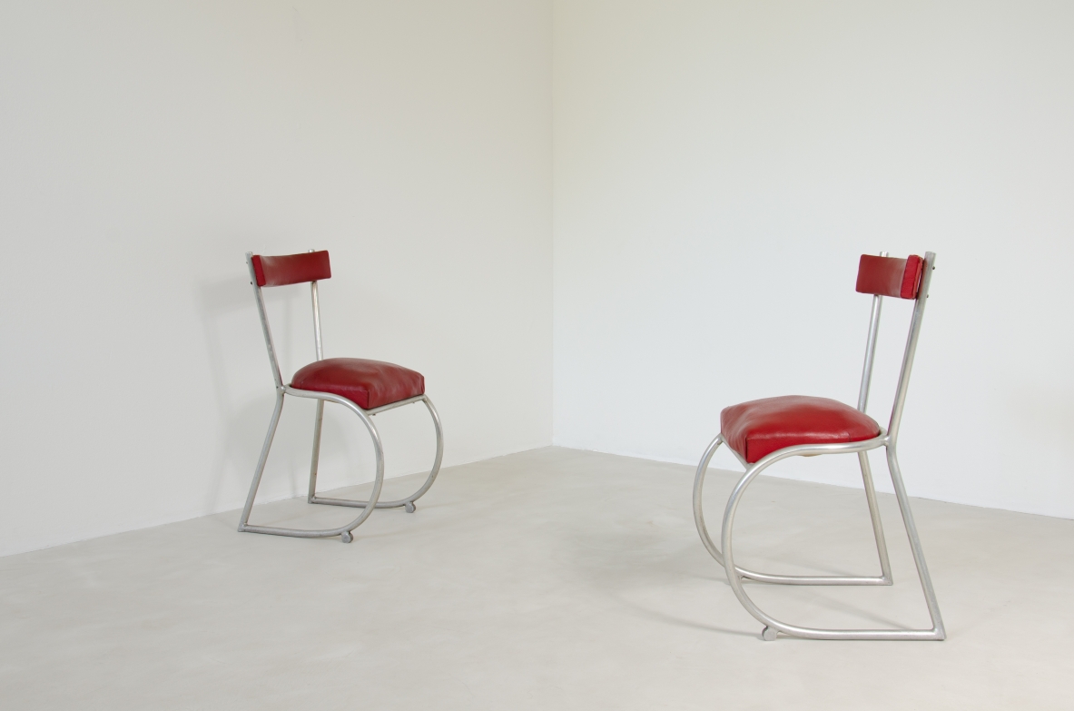Pair of Italian1930's chairs made of curved metal and seat and back with original upholstery.