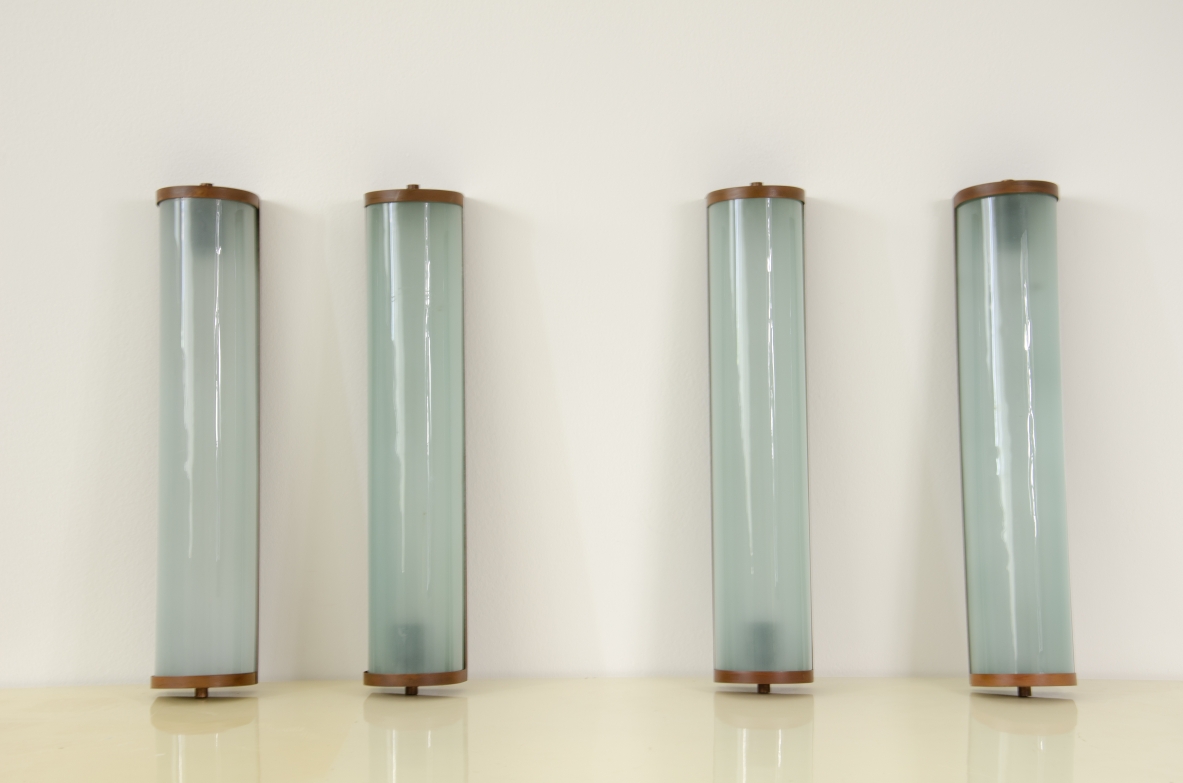 Four large wall lights in glass and brass, 1940s.