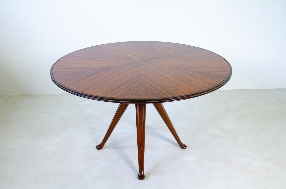 Osvaldo Borsani, splendid round table with extensions, specially produced on commission for Lucio Fontana residence in Milan, 1940's.