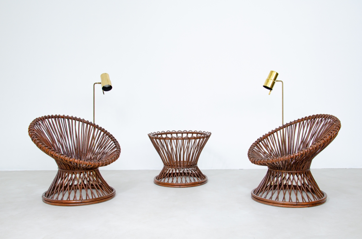 Pair of 1950's armchairs in rattan with a coffee table with glass top. Bonacina, 1950ca.