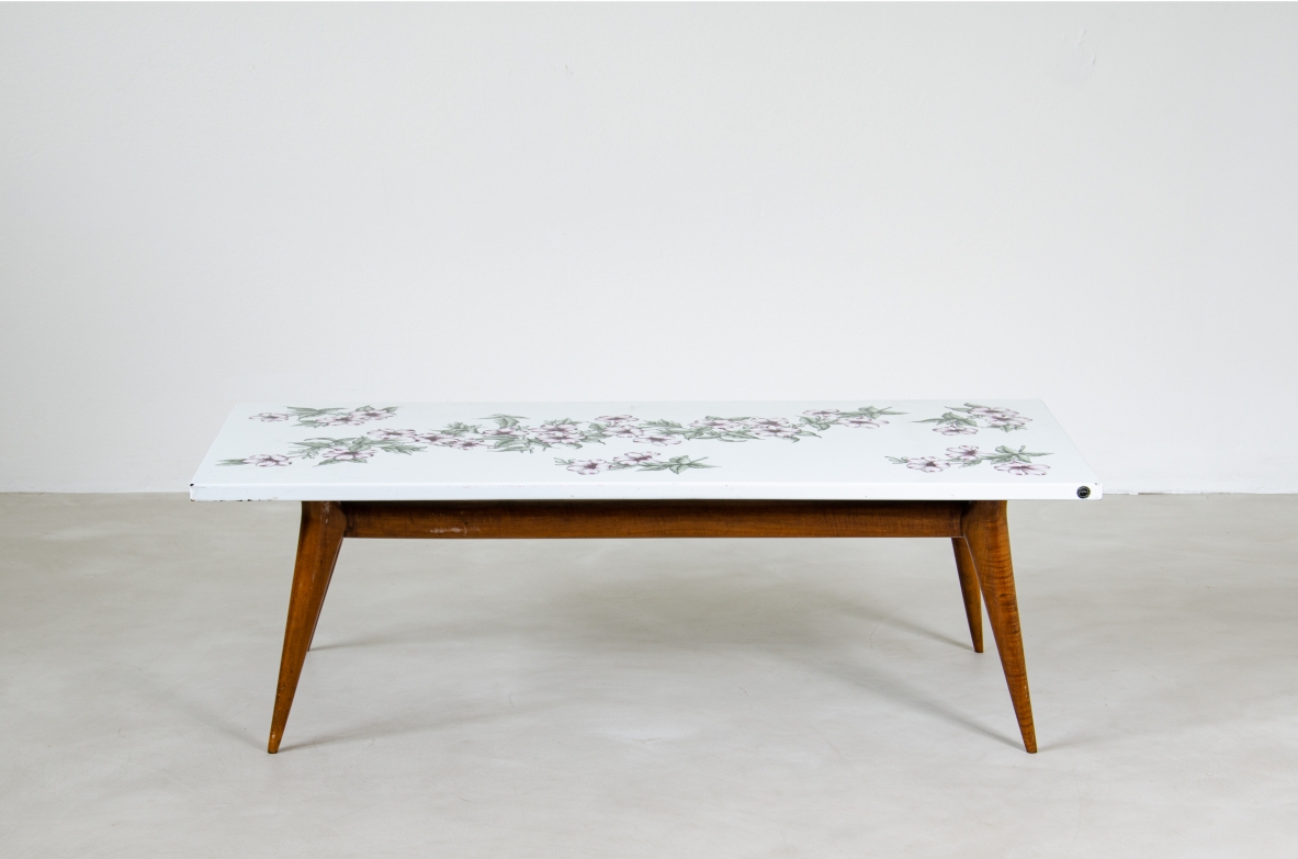 Piero fornasetti, 1960's low table with decorated top.