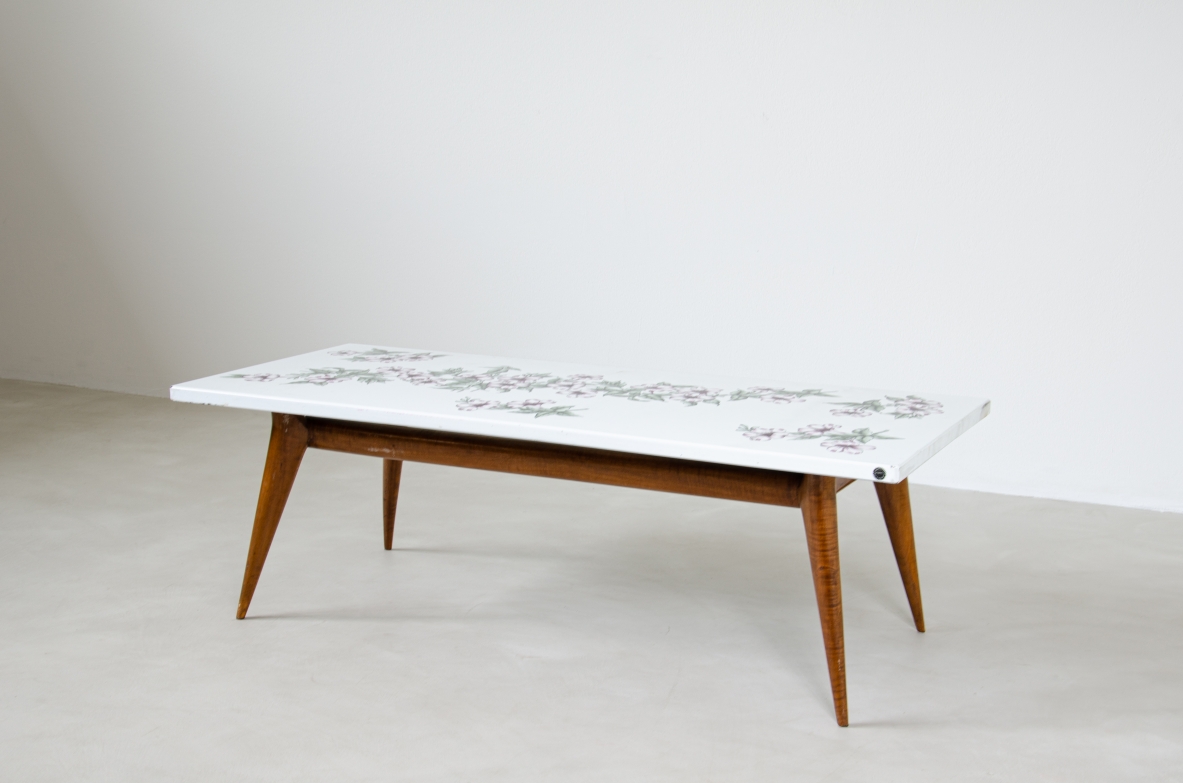 Piero fornasetti, 1960's low table with decorated top.