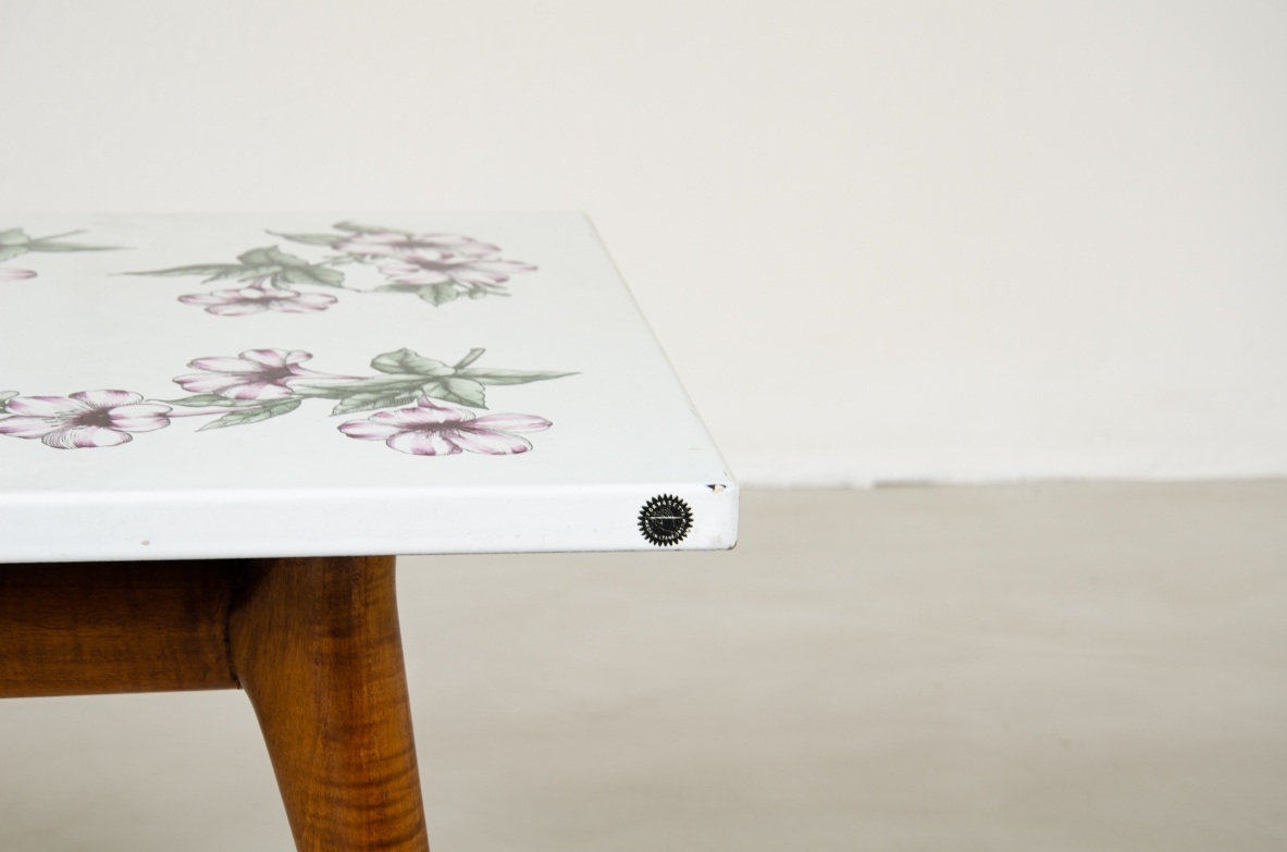 Piero fornasetti, 1960's low table with decorated top.