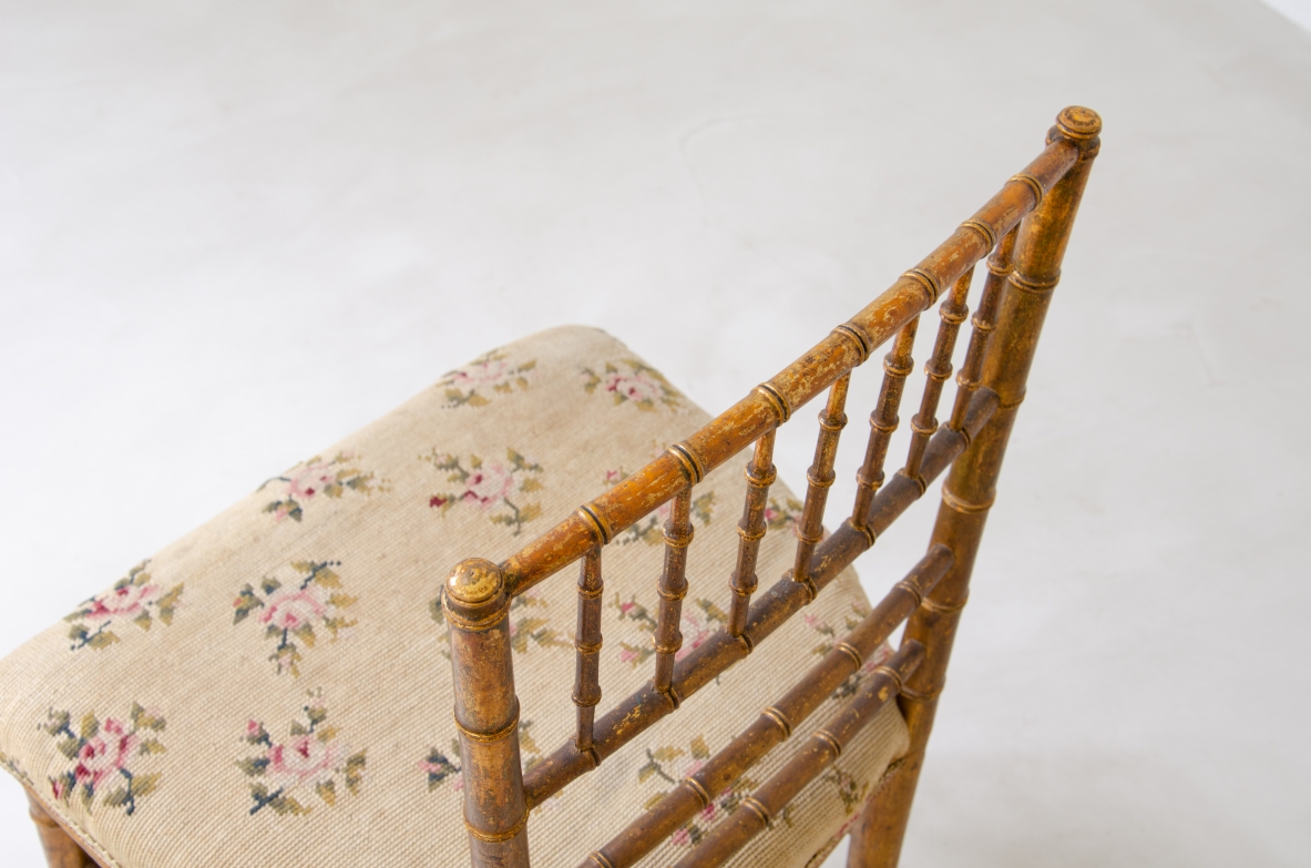 Pair of chairs in turned and gilded wood with upholstered seat with original embroidered fabric.  Italy, early XX Century.