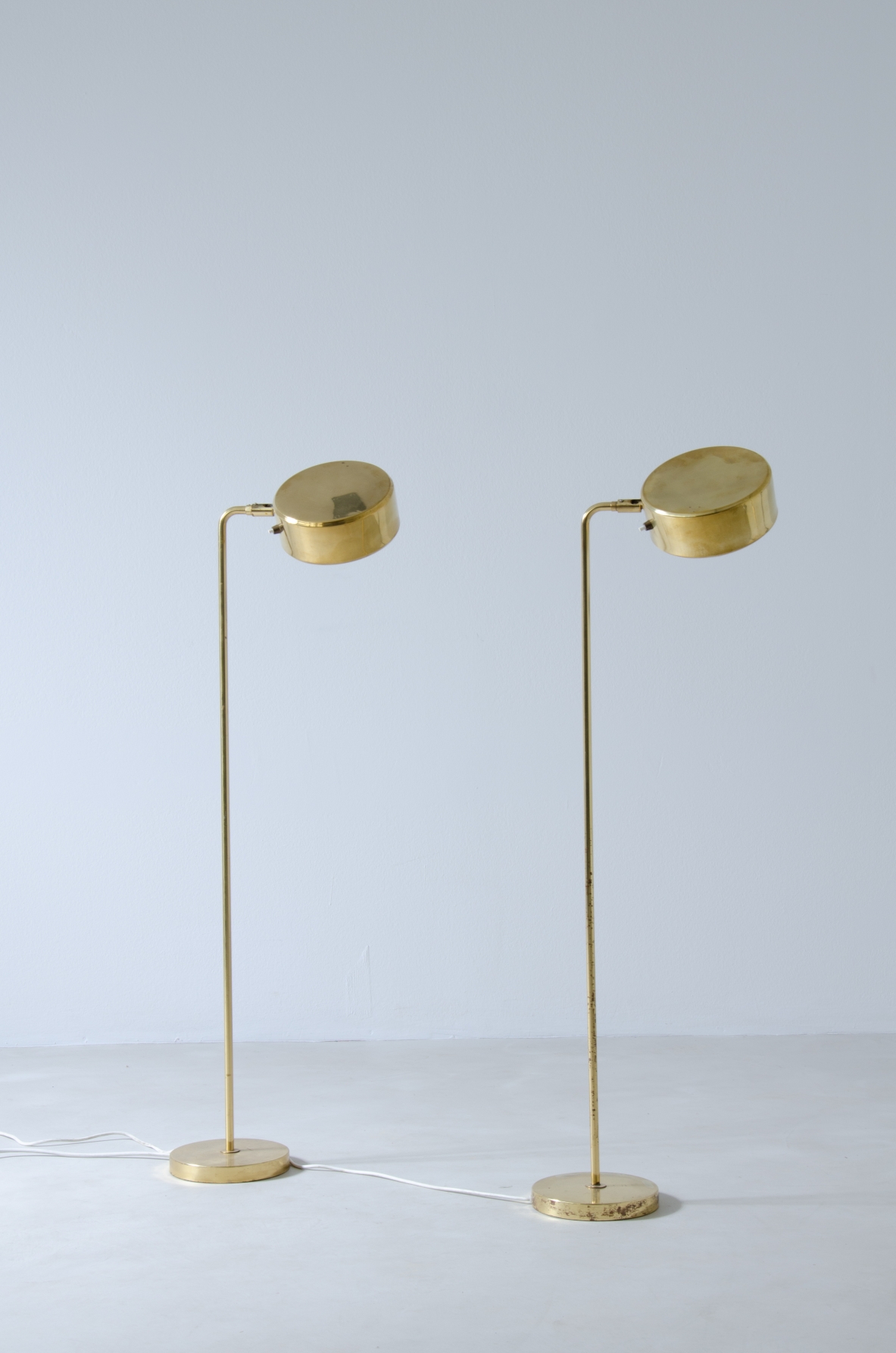 Hans Pherson, pair of brass lamps with adjustable shade. Sweden early 1960s.