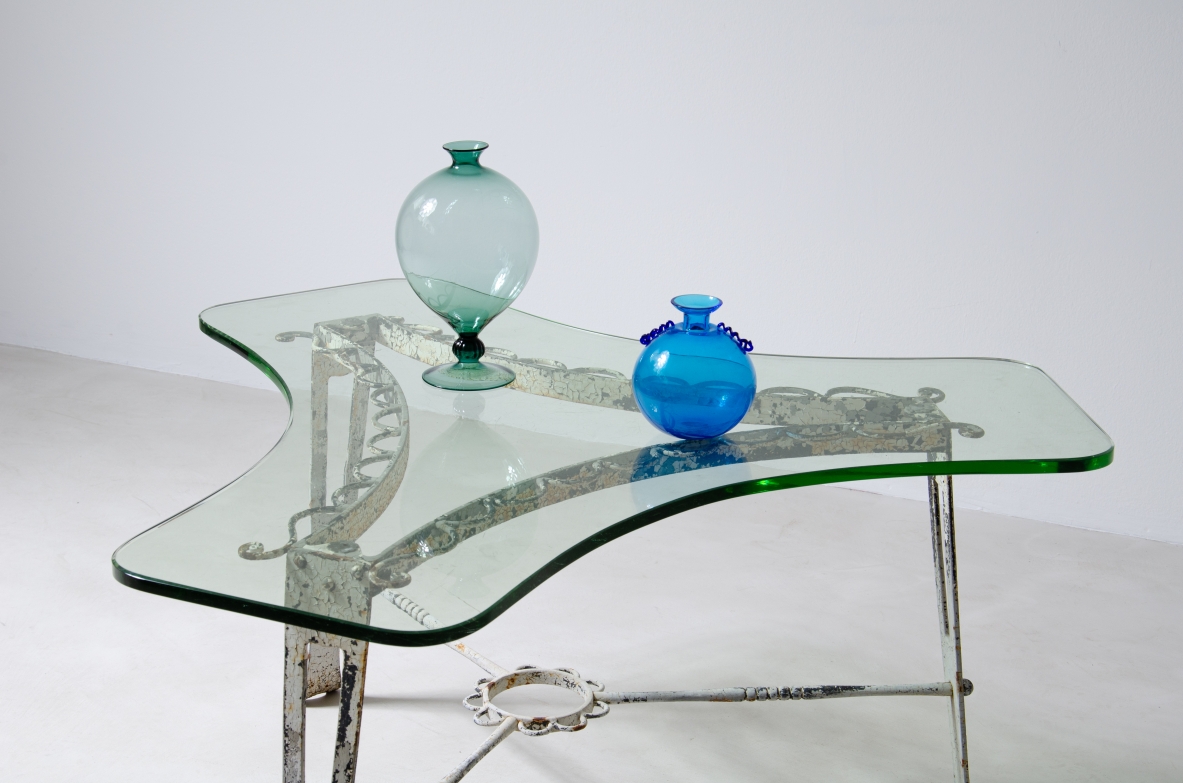 Luigi Brusotti (1877-1959)  Low table in wrought iron with thick shaped glass top.  Milan, 1950s.