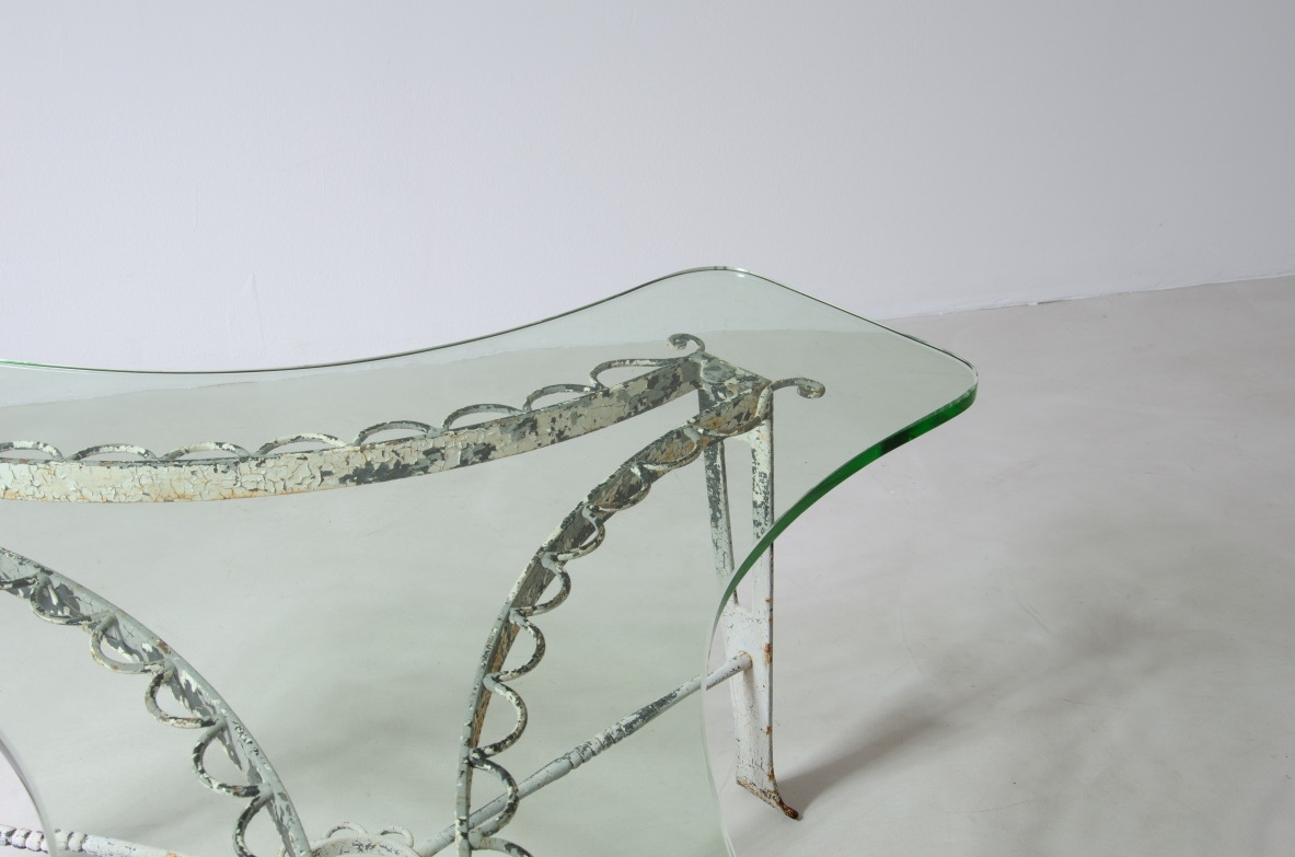 Luigi Brusotti (1877-1959)  Low table in wrought iron with thick shaped glass top.  Milan, 1950s.