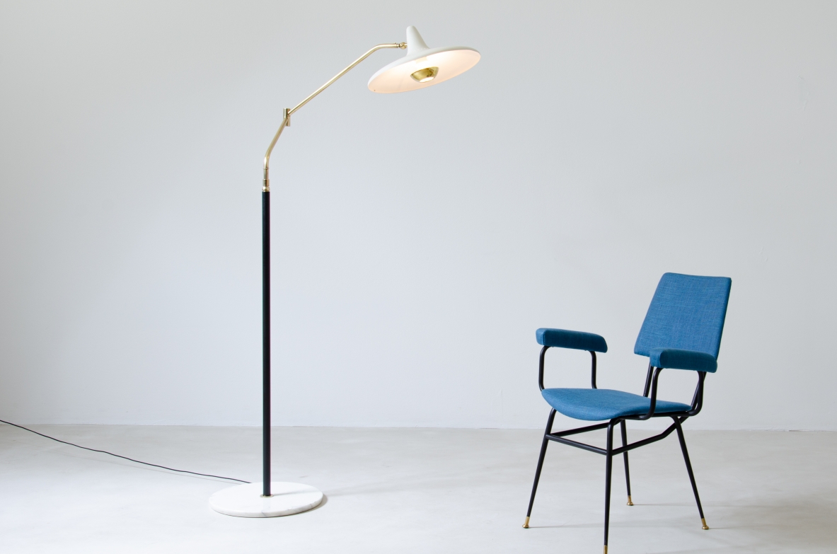 Stilnovo, floor lamp with articulated brass arm, adjustable in height and in all directions, painted metal shade and marble base.  Stilnovo brand, 1955.