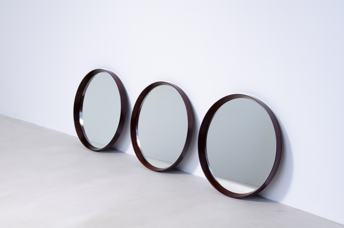 Three round mirrors with wooden frame in hand polished teak wood.  Scandinavian manufacture, 1960s.