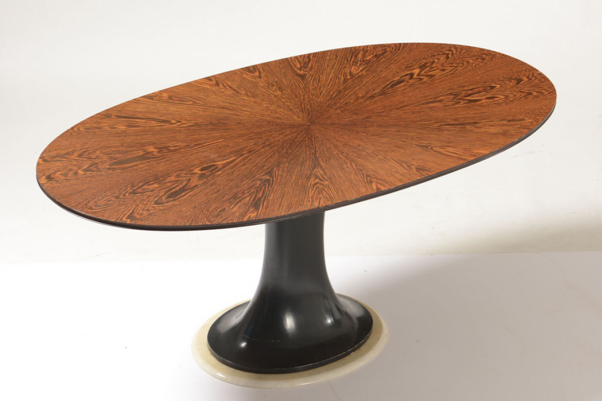 Very elegant oval table with turned base in petrol blue lacquered wood and marble disc.  Palm wood veneer top.  Turin School, 1960's.