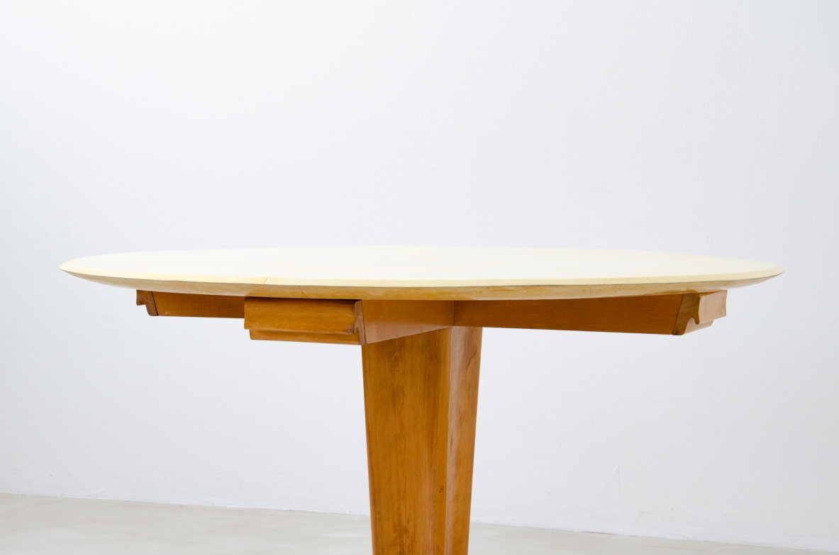 Rare Italian 1950's round table with parchment top, four drawers and marble base.