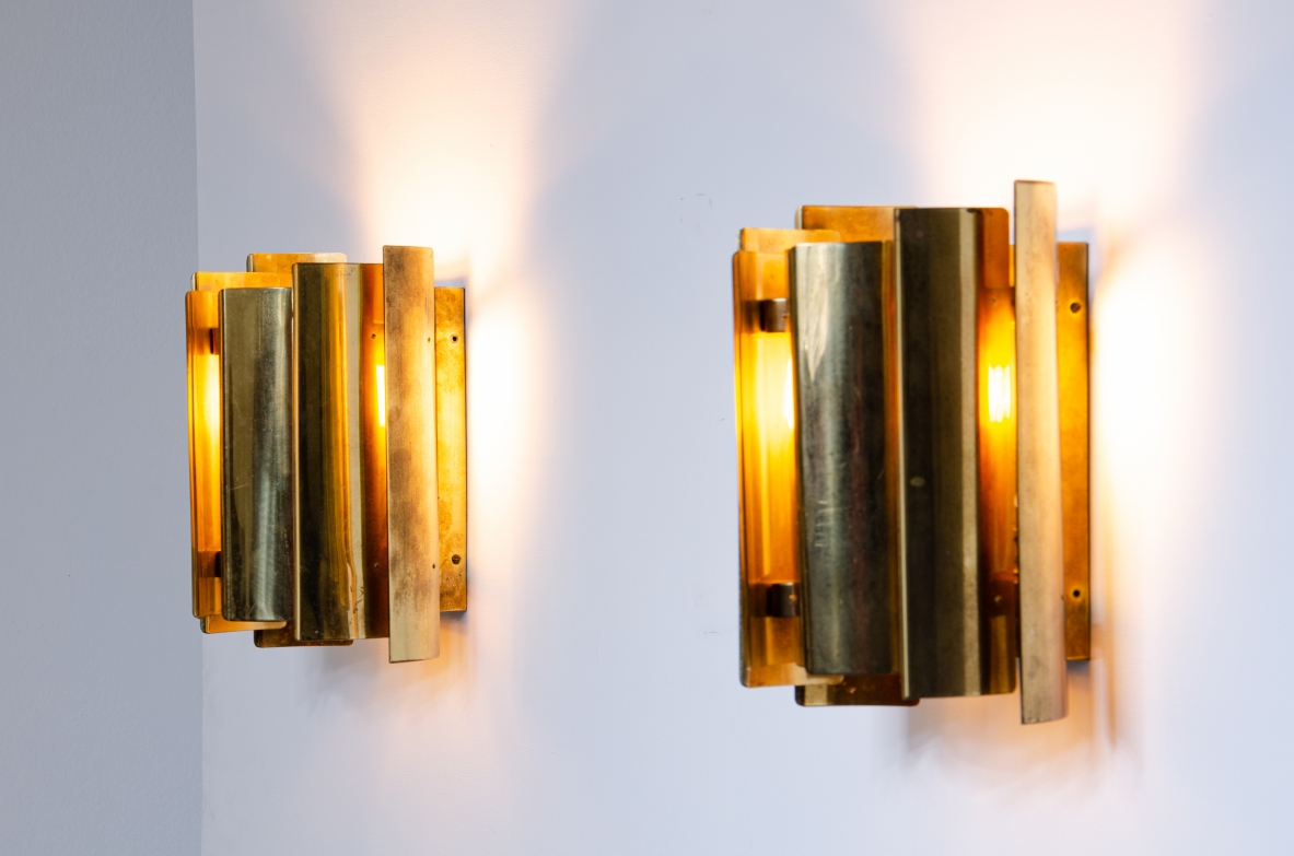 Pair of Scandinavian wall lights in curved brass.  Prod. Falknbergs, Sweden 1960's.