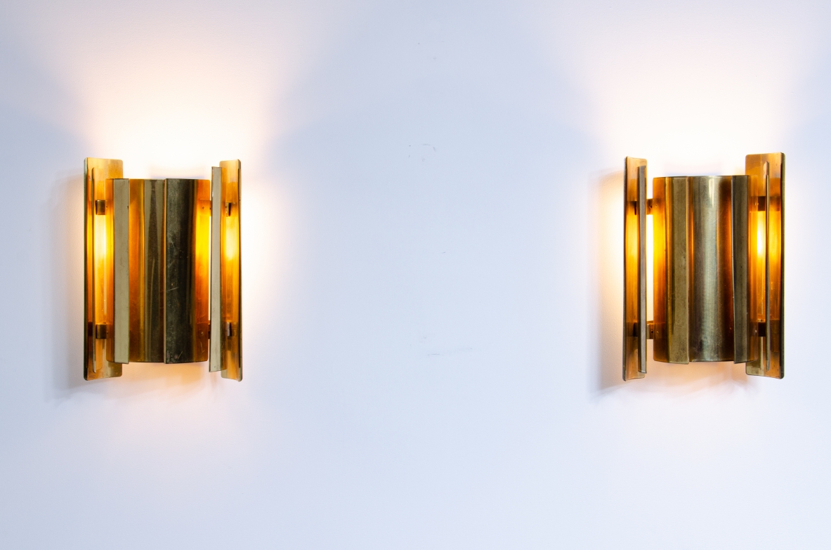 Pair of Scandinavian wall lights in curved brass.  Prod. Falknbergs, Sweden 1960's.