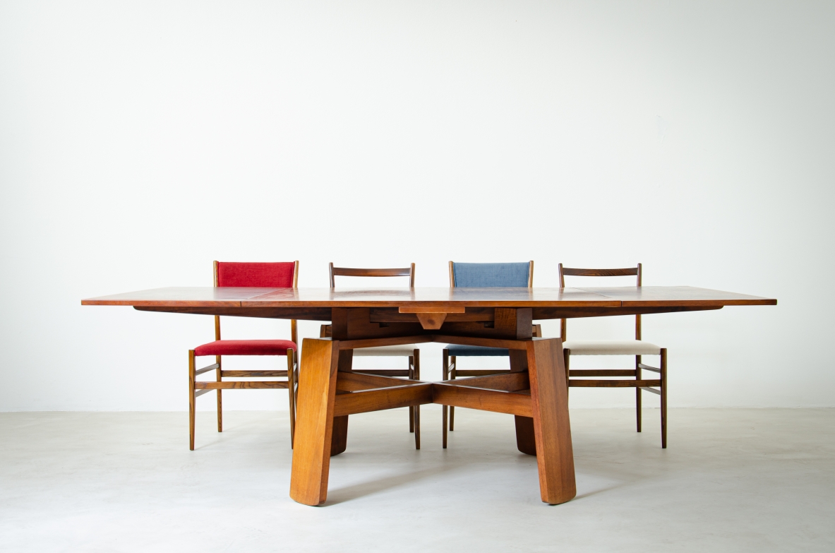 Italian Modern Extension Dining Table in walnut designed by Silvio Coppola. Manufactured by Bernini Italia, 1964.