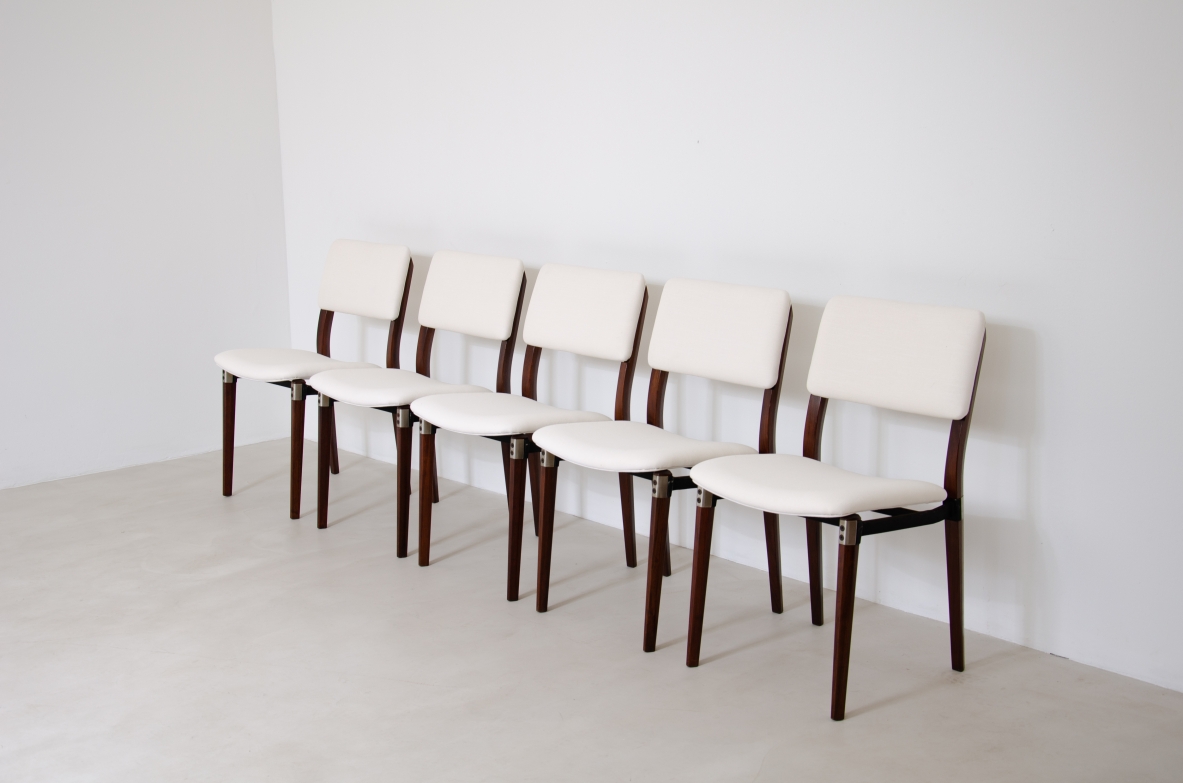 Eugenio Gerli (1923-2013)  Rare set of 8 chairs with structure in rosewood, metal and steel details.  Tecno Manufacture 1960.