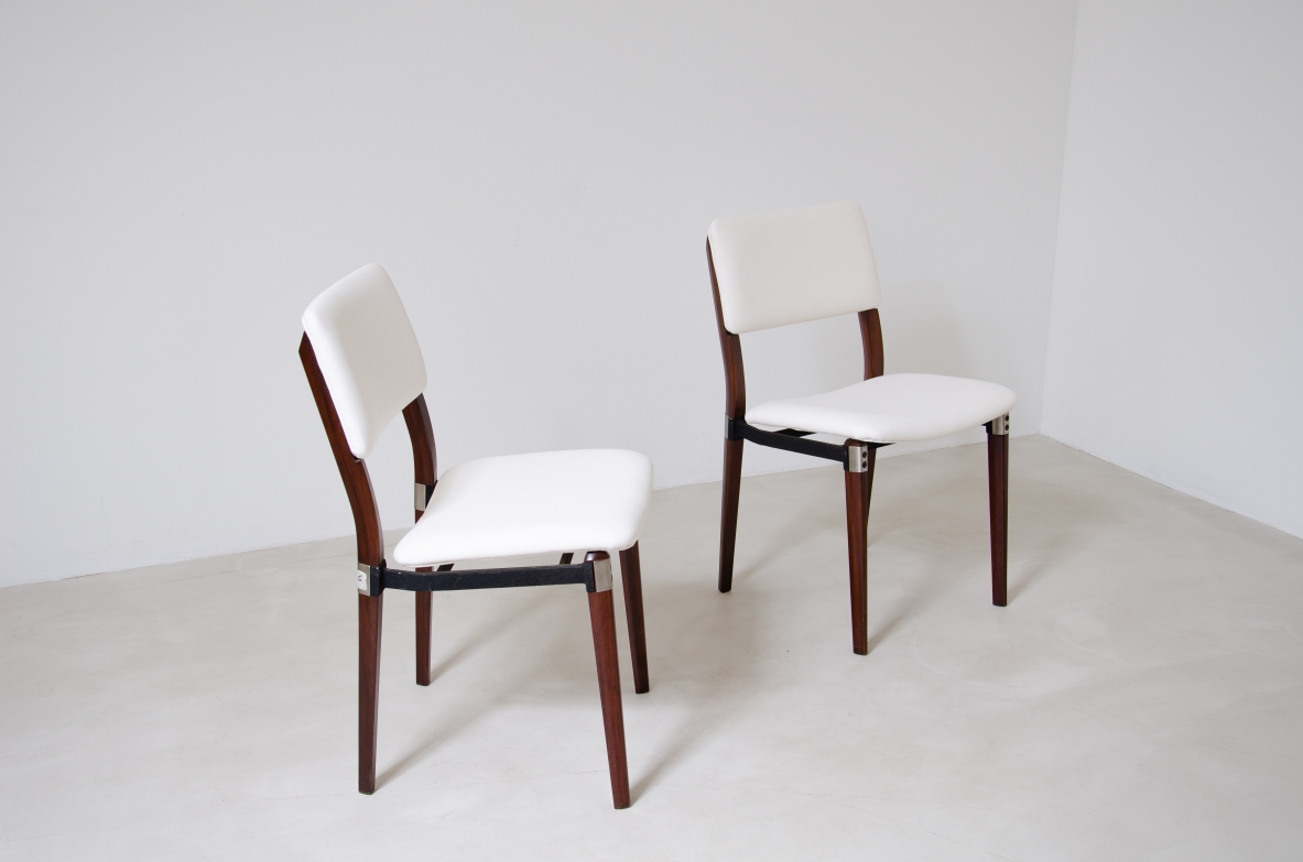 Eugenio Gerli (1923-2013)  Rare set of 8 chairs with structure in rosewood, metal and steel details.  Tecno Manufacture 1960.