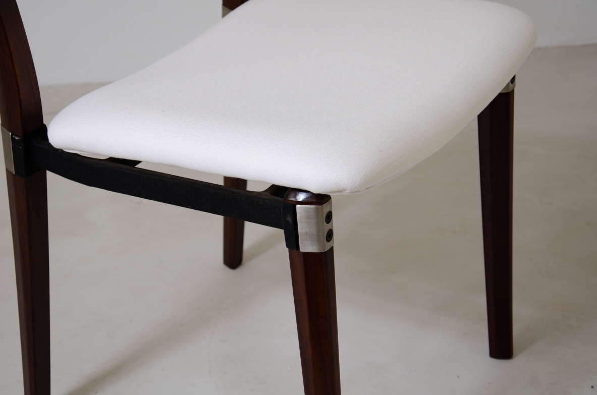 Eugenio Gerli (1923-2013)  Rare set of 8 chairs with structure in rosewood, metal and steel details.  Tecno Manufacture 1960.