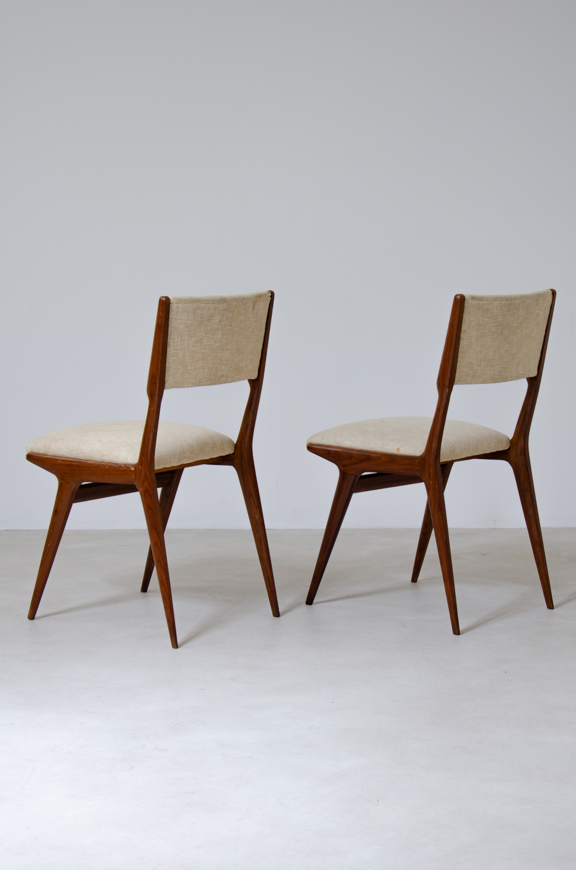 Carlo de Carli (1910 - 1999)  Set of six Model 158 chairs with upholstered seat and back.  Produced by Cassina, 1953-1954
