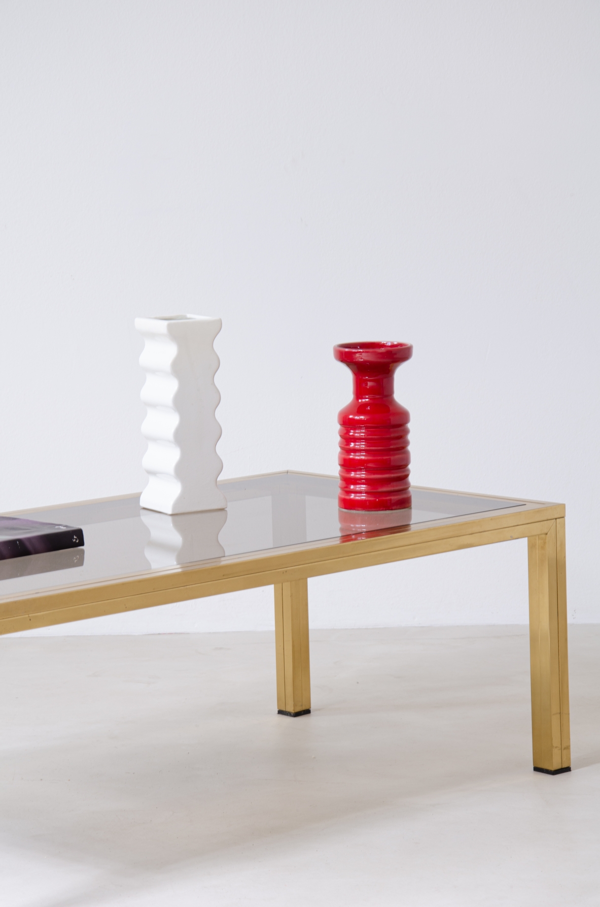 Romeo Rega (1925-1984)  Large Coffee Table in brass with burnished glass top.   Manufacture Rega & Co, Rome, 1970s.