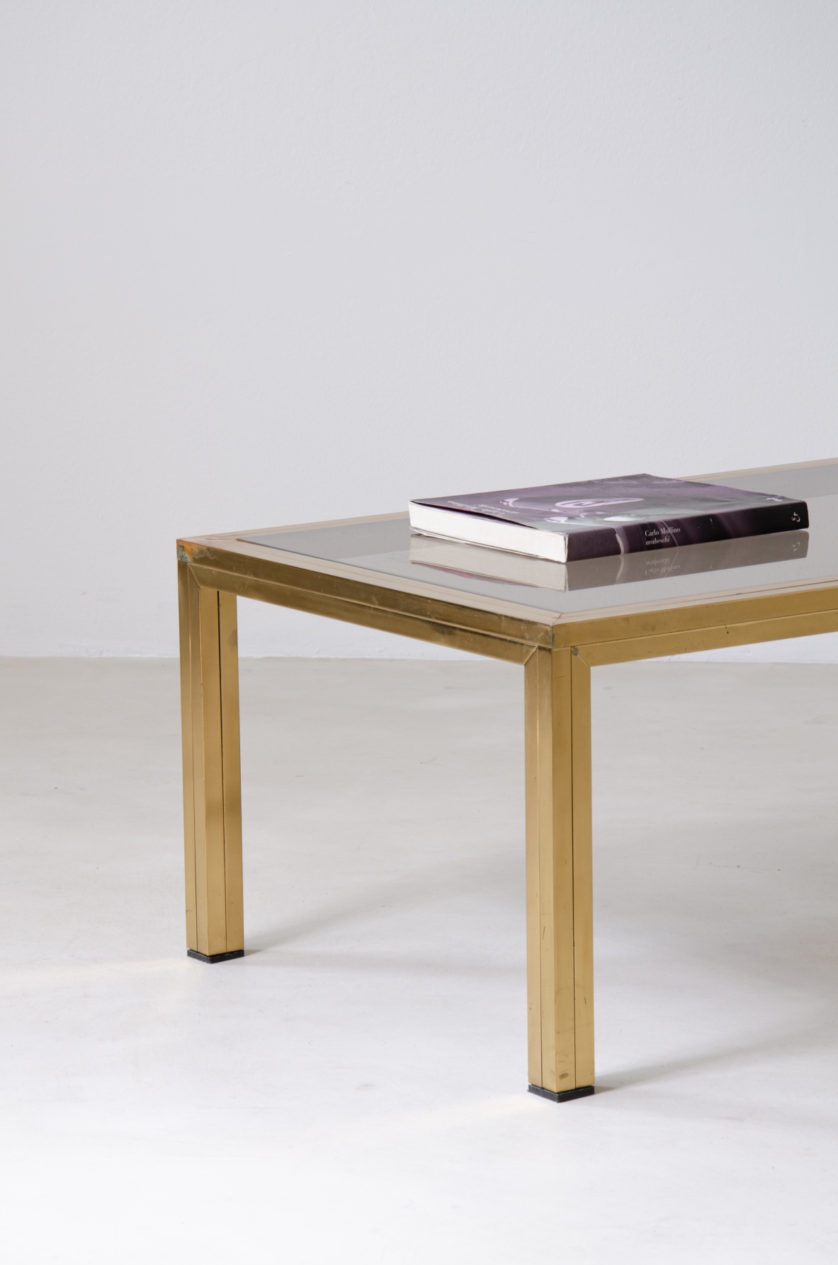 Romeo Rega (1925-1984)  Large Coffee Table in brass with burnished glass top.   Manufacture Rega & Co, Rome, 1970s.