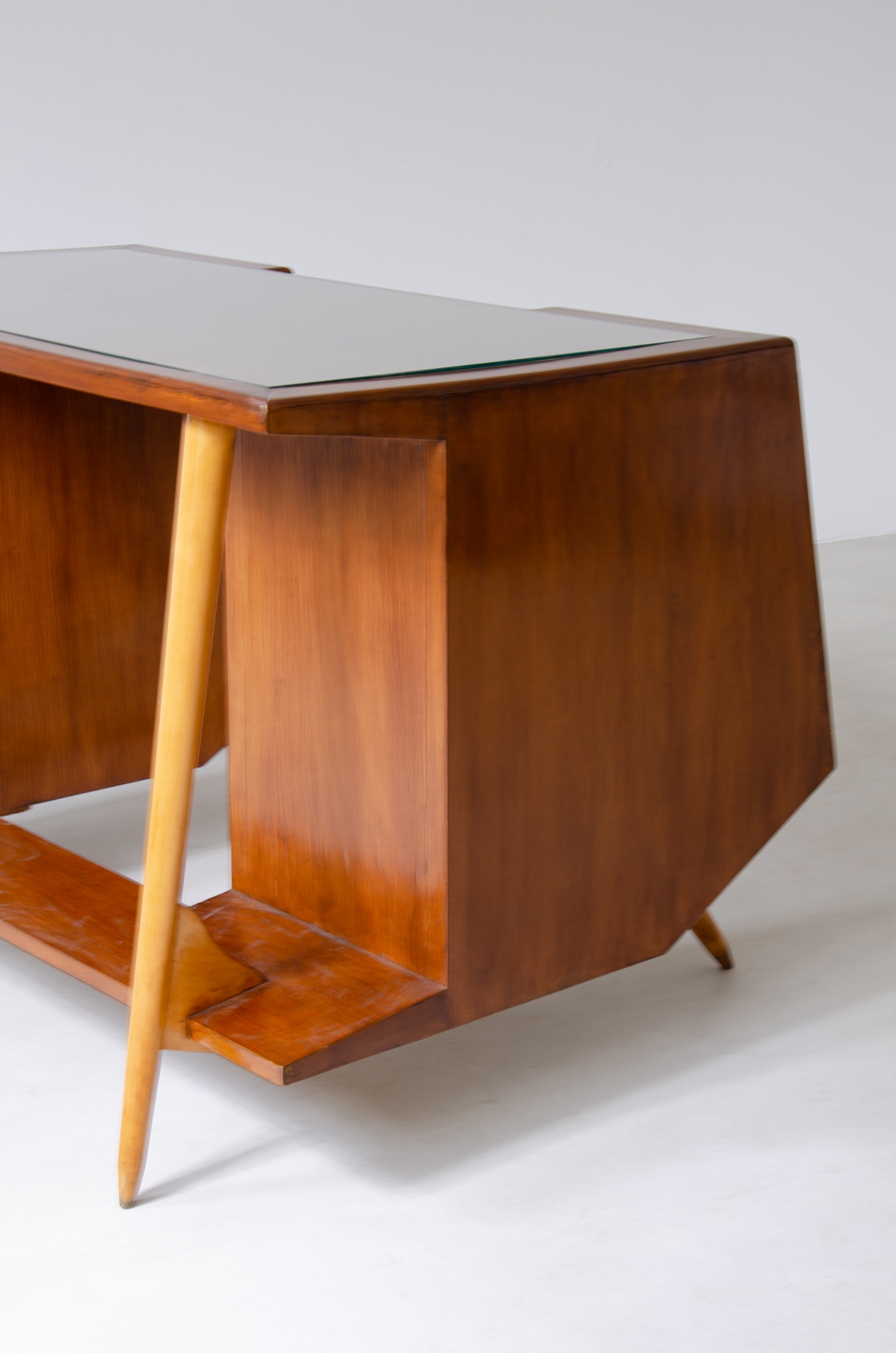 Luigi Olivieri. Rare modernist desk in walnut and blond maple with ground glass top. 1950's Italian manufacture