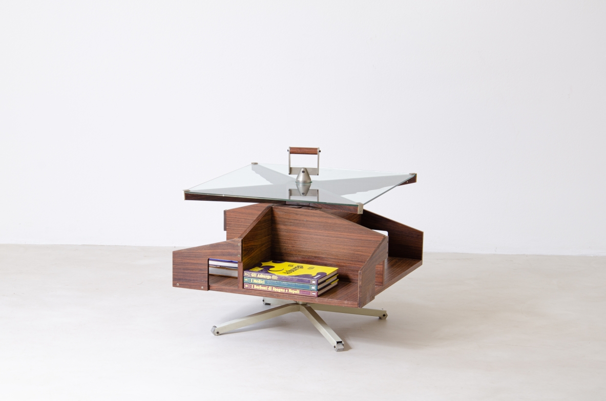 Ico Parisi (1916-1996)  Low table in walnut with swivel shaped structure and swivel glass top with steel and wood handle.1958