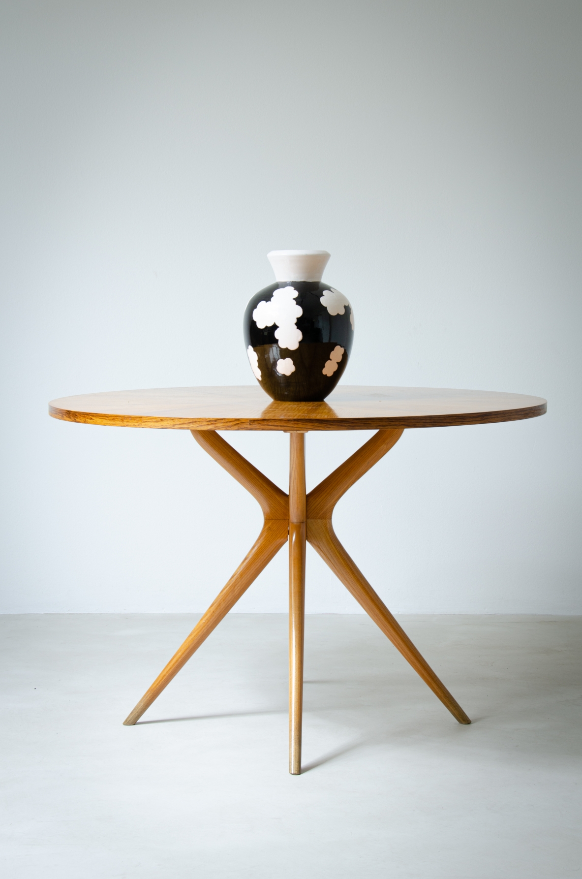 Table with base in blond wood and top in olive wood.  1950's Italian manufacture.