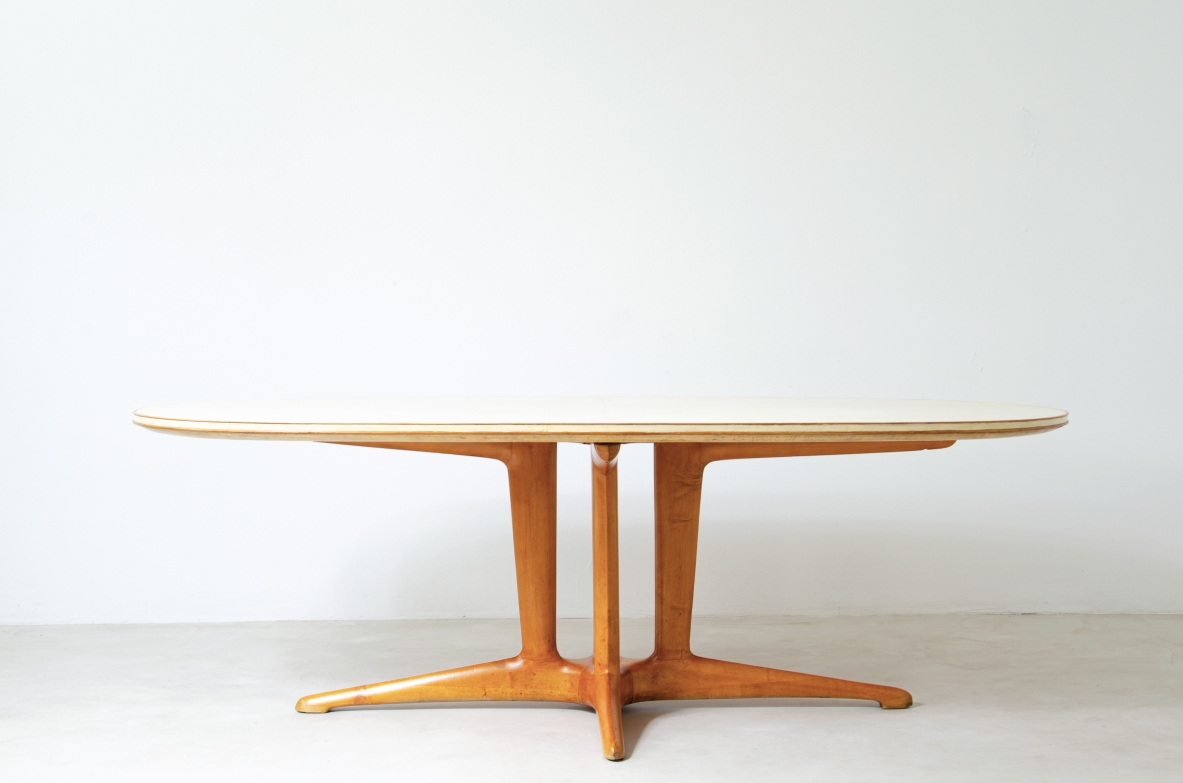 Unique large table with elegant structure in maple wood and top covered with goat skin.  Italian 1950s manufacture.