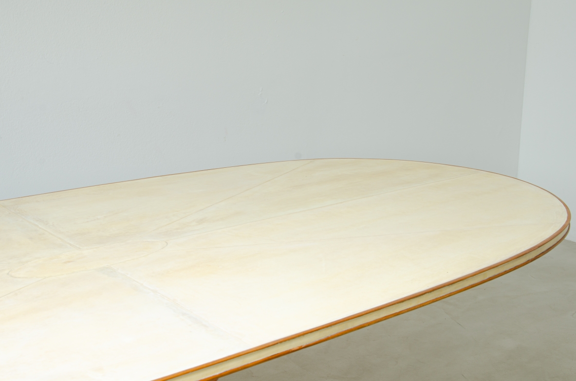 Unique large table with elegant structure in maple wood and top covered with goat skin.  Italian 1950s manufacture.