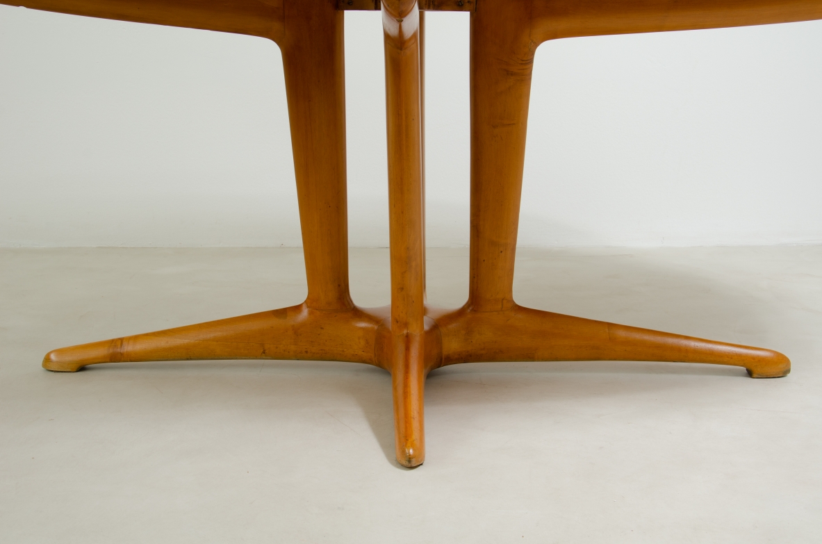 Unique large table with elegant structure in maple wood and top covered with goat skin.  Italian 1950s manufacture.