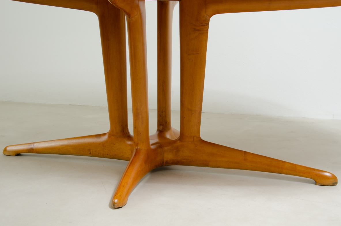 Unique large table with elegant structure in maple wood and top covered with goat skin.  Italian 1950s manufacture.