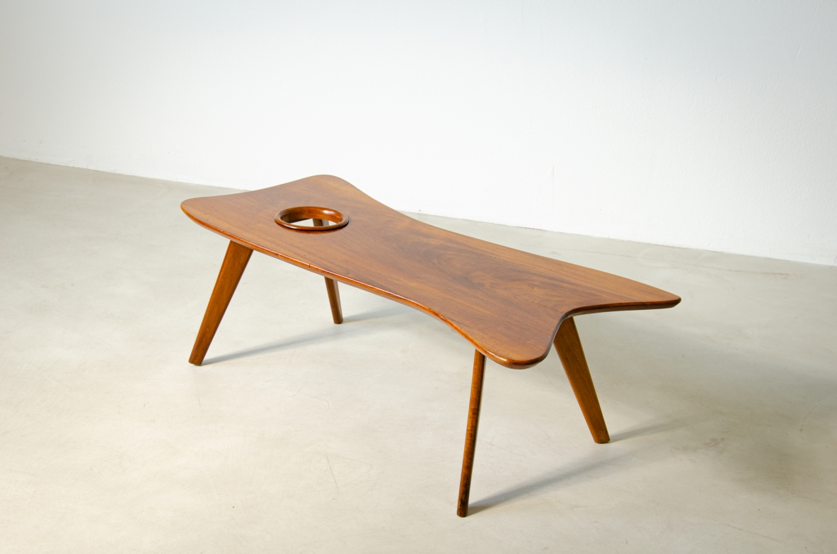 Giuseppe Scapinelli (1891 - 1982)  Unique wooden coffee table with shaped top with a hole inspired by a painter's palette.  Brazil, 1950's.
