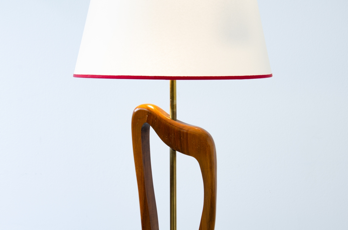 Unique three-light sculptural floor lamp in brass and shaped wood with parchment shade. Italian manufacture, 1950's.
