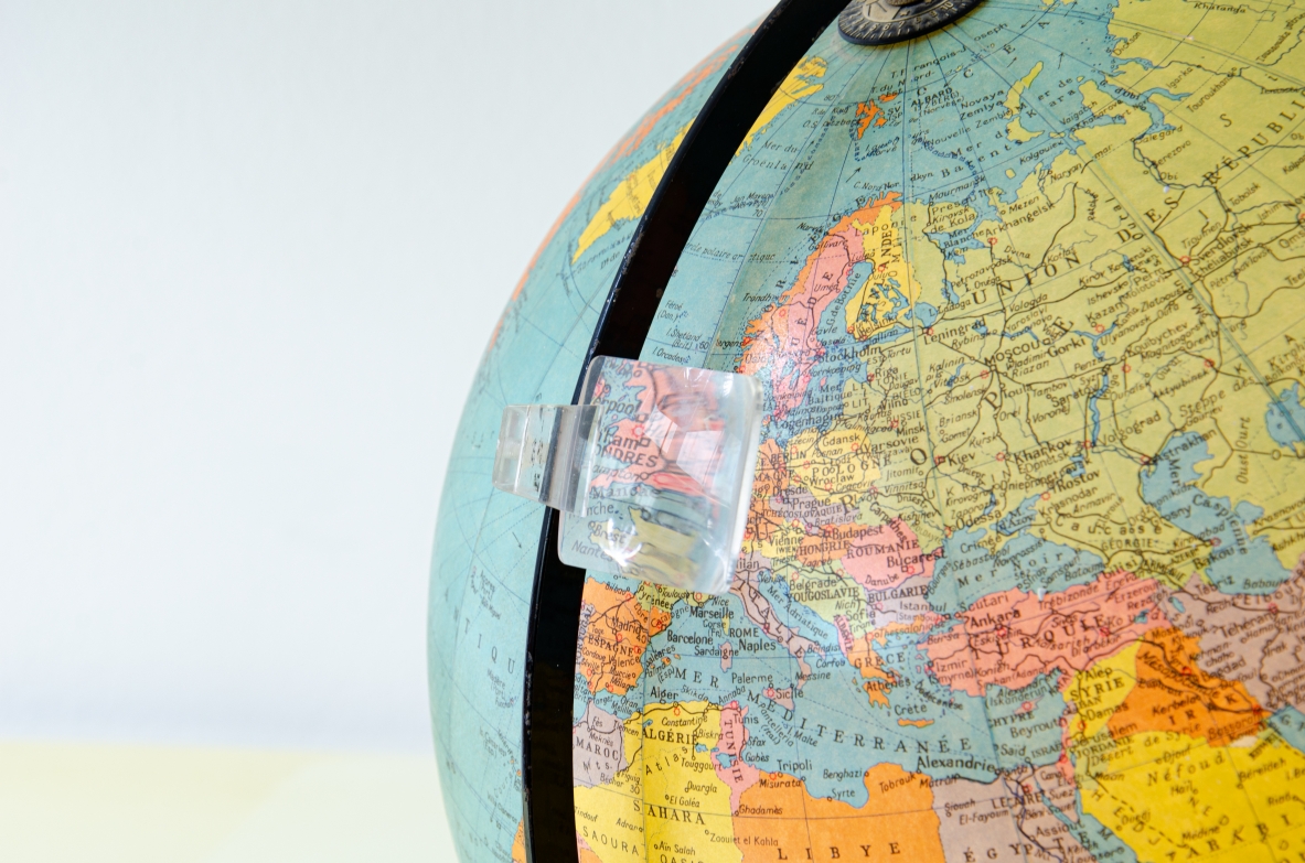 Table globe with glass sphere illuminated inside and with adjustable lens. Cartes Taride, Paris, 1950's.