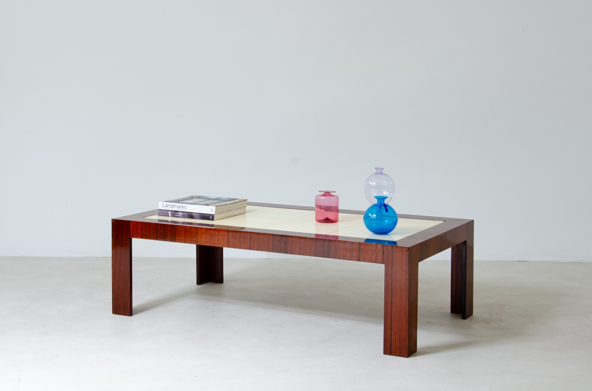 Very elegant Art Deco low table in rosewood with goat skin top.  France 1930's.