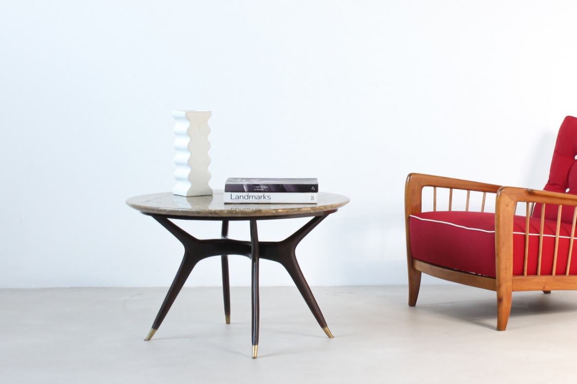 Italian 1950's elegant coffee table,with fine elegant bronze tips and marble top.