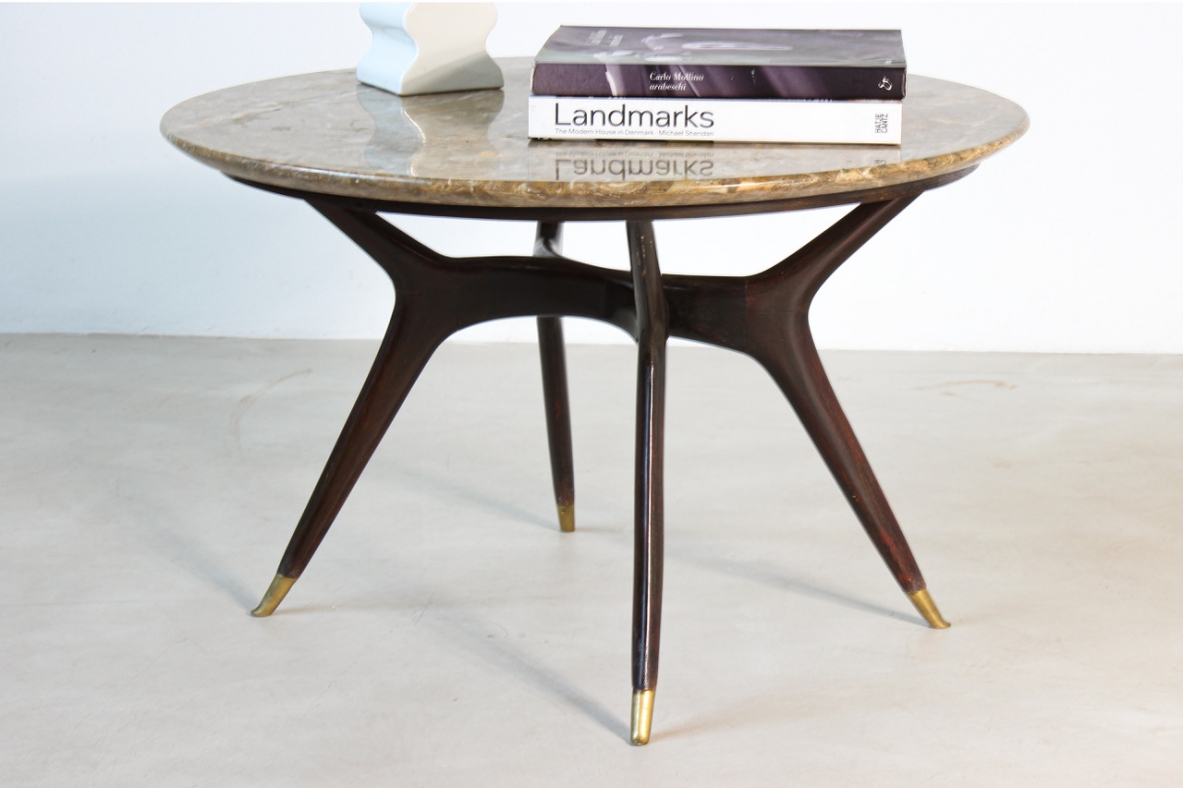 Italian 1950's elegant coffee table,with fine elegant bronze tips and marble top.