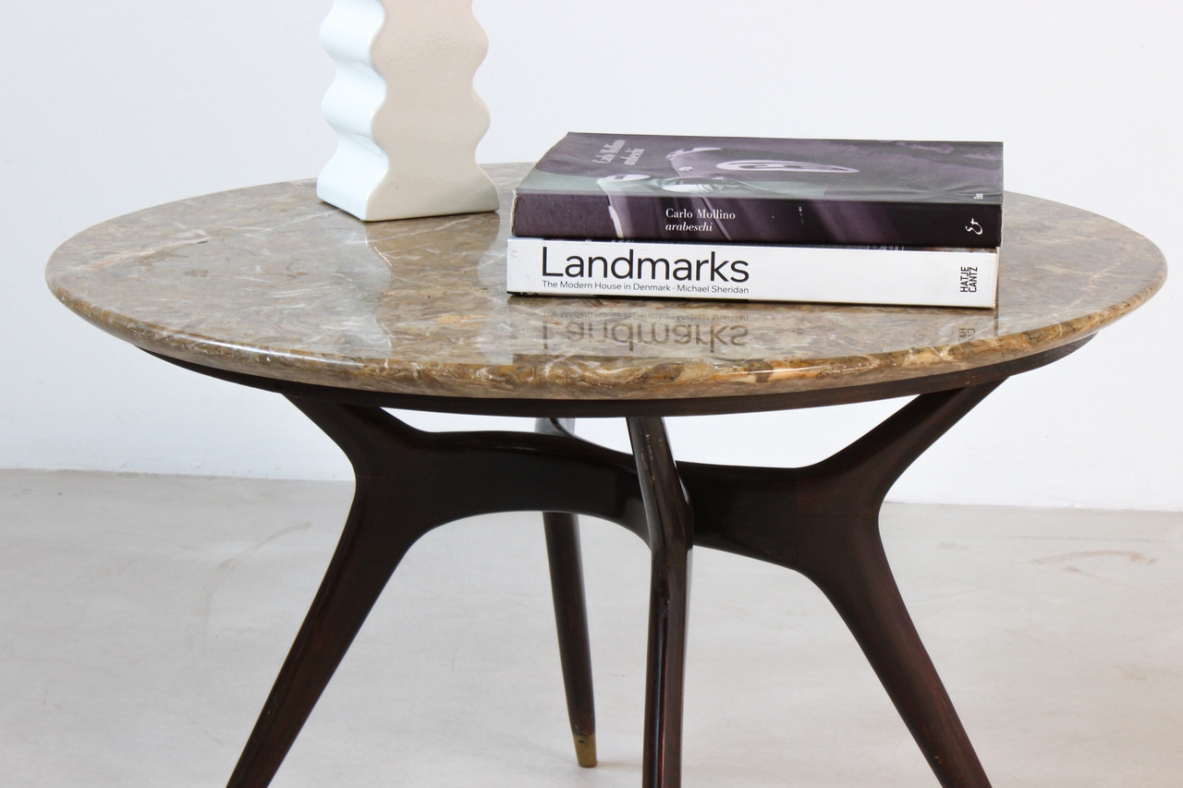 Italian 1950's elegant coffee table,with fine elegant bronze tips and marble top.