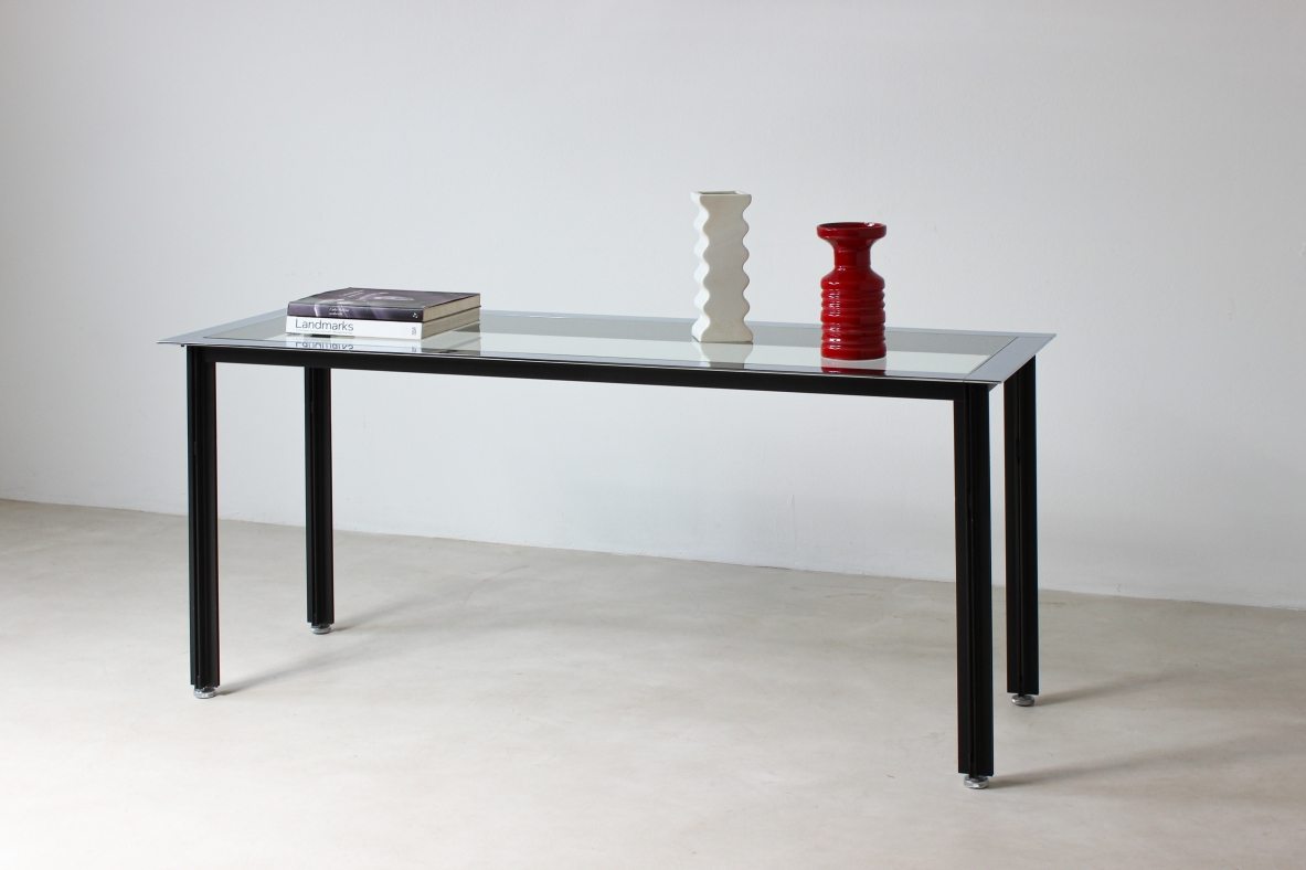 Luigi Caccia Domignoni.Console con piano in vetro con fascia in metallo cromato. Produzione Azucena, 1970ca